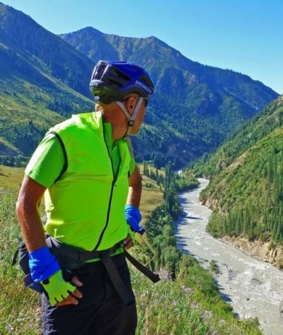 Bob Harrison Cycling on the  tour with redspokes